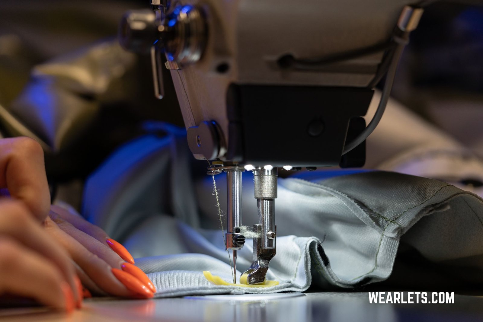 Private label hoodie manufacturing process showing stitching and detailing