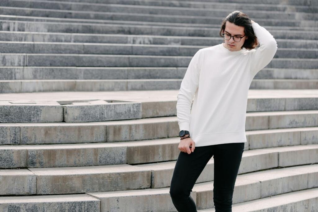 At Wearlets, we specialize in manufacturing custom sweatshirts designed to blend comfort, durability, and style — perfect for fashion brands, corporate wear, wearlets sweatershirt by a long hair men on a stair
custom sweatshirt manufacturer