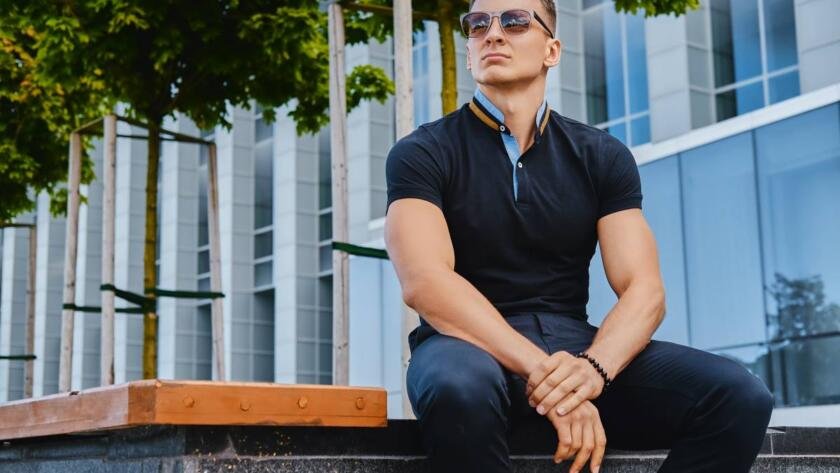 man wearing polo shirt in business casual office outfit