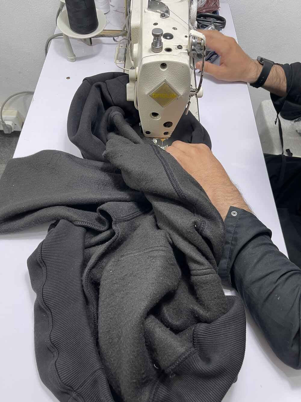 Tracksuit manufacturing process on the Wearlets production