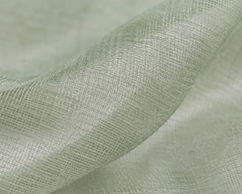 Macro shot of chiffon fabric weave showing its sheer crisscross texture
