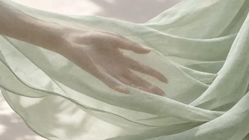 Chiffon fabric draped to show its sheer texture and lightweight feel
